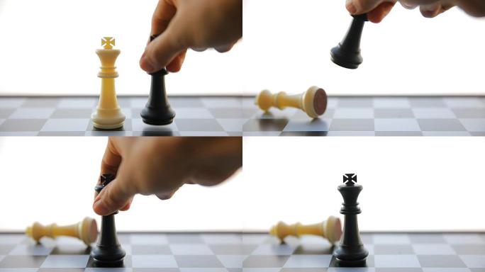 在国际象棋游戏中，男人的手在移动国王