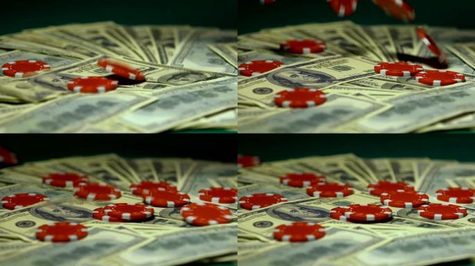 赌场筹码落在美元钞票上，大赢家，杰克锅，慢动作