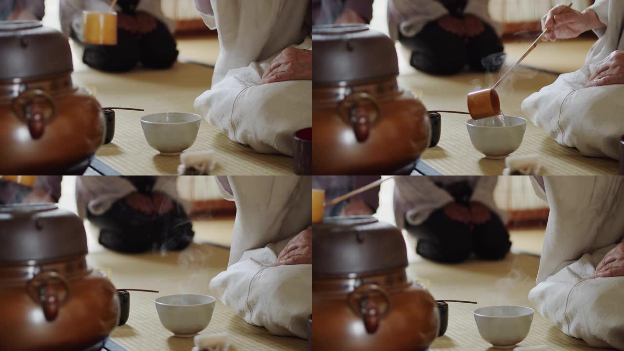 在传统的日本茶道上，女主人将热气腾腾的水倒入碗中