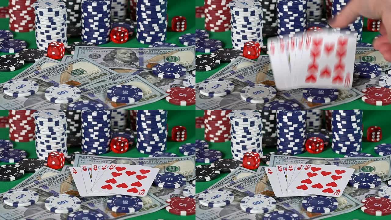 扑克玩家揭示皇家同花顺组合，慢动作。比赛赢了,钱