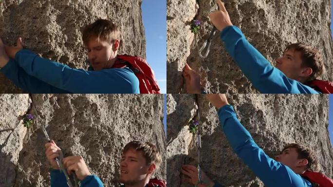 男性登山者登上岩石悬崖，建立保护