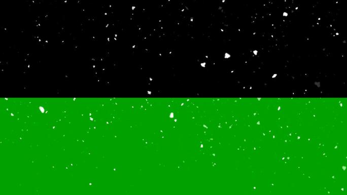 落雪孤立在黑色背景绿屏循环动画。