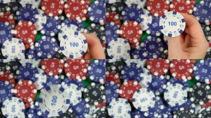 赌徒把扑克筹码抛向空中，扑克背景，慢动作