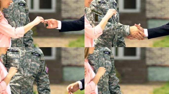 经纪人为美国士兵家庭提供钥匙并握手，社会计划
