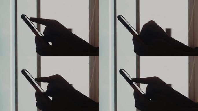 使用智能手机拍摄女性手的特写镜头