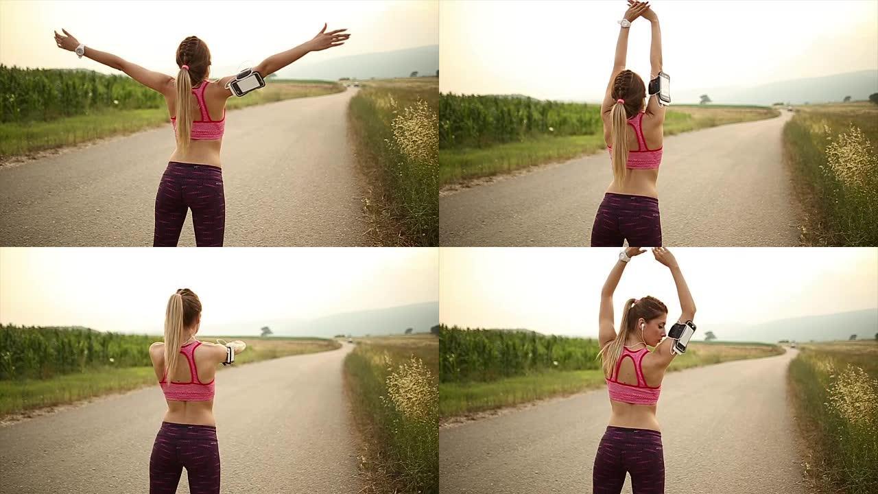 准备慢跑的女人清晨傍晚瑜伽锻炼热身运动