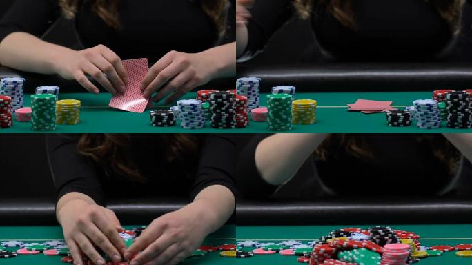 女人看着自己的牌，全押，合理的风险，扑克赌博