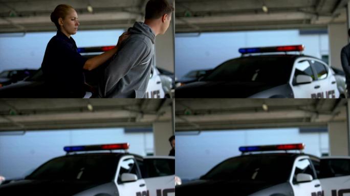 警察妇女拘留危险的流氓，将他放在车里，预防犯罪