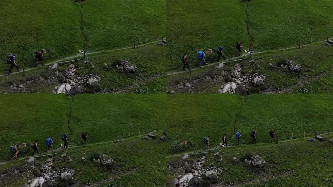 沿着阿尔卑斯山的铁丝网围栏徒步旅行