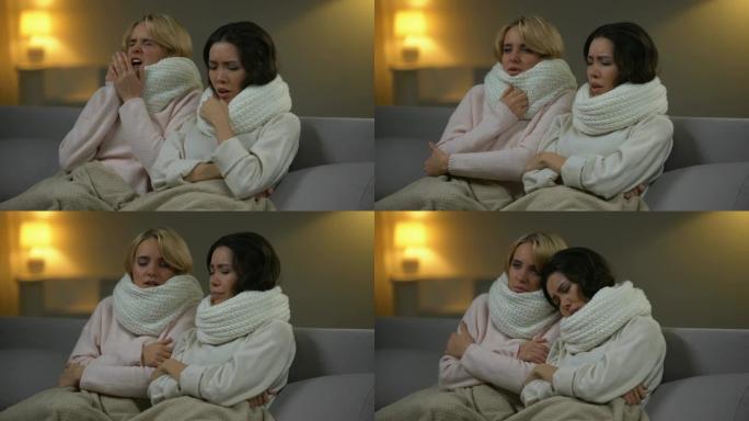 两个生病的女孩坐在床上，带着围巾打喷嚏，流感病毒，医疗保健