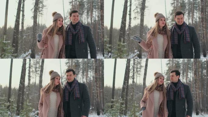在冬日白雪皑皑的森林里，身着大衣、披巾的青年男女在散步、玩乐。相爱的情侣一起度过情人节