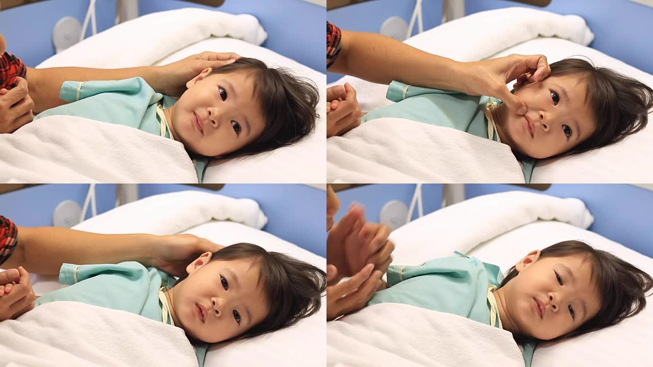 小女孩生病在医院小孩躺在病床上