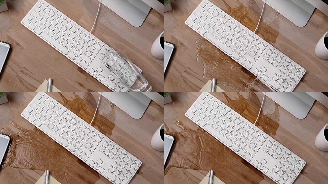 SLO MO LD人打翻一杯水，将其洒在白色键盘和手机上