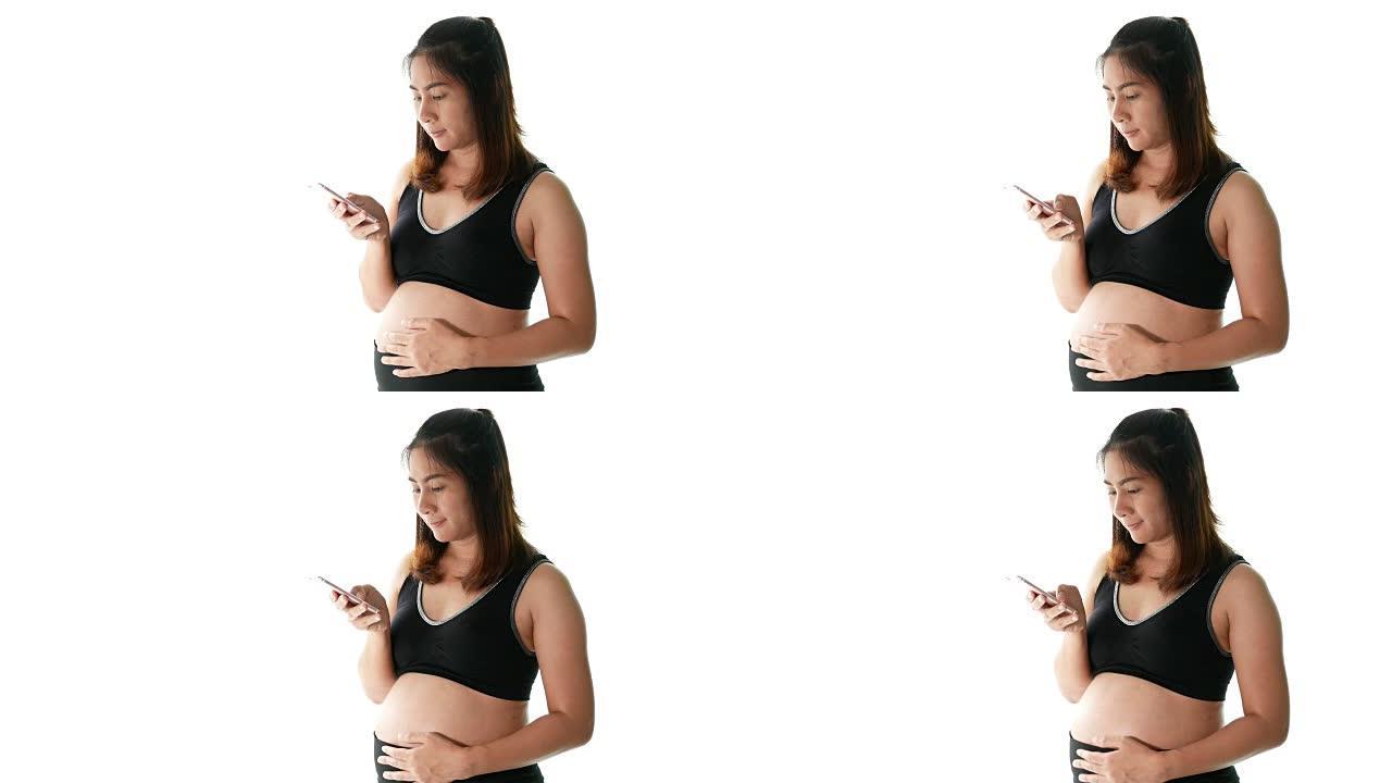 孕妇玩手机的镜头孕妈妈抚肚子孕妇看手机