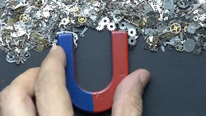 马蹄形磁铁在人类手写文字搜索引擎与金属钟表在黑板上