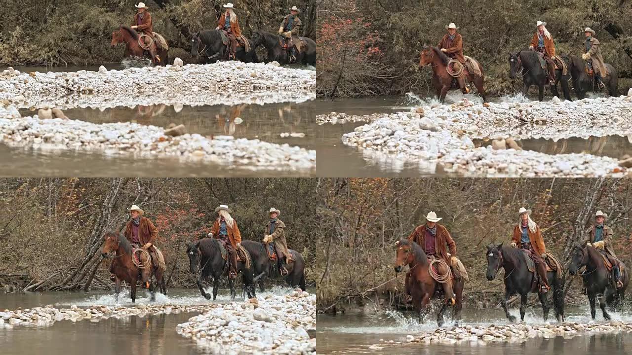 两名牛仔和女牛仔骑马过河