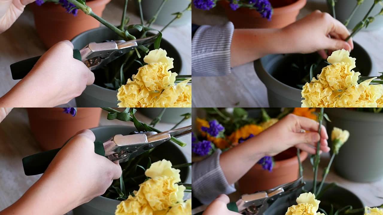 年轻妇女在花店工作时修剪切花的茎