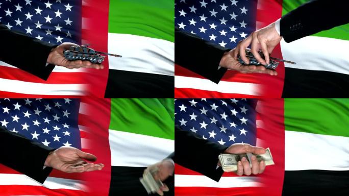 美国和阿联酋官员在国旗背景，伙伴关系上交换金钱