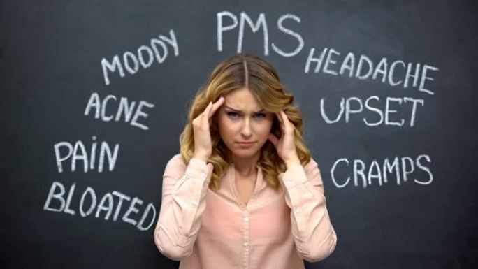 妇女因pms的虚构问题，激素失衡而头痛