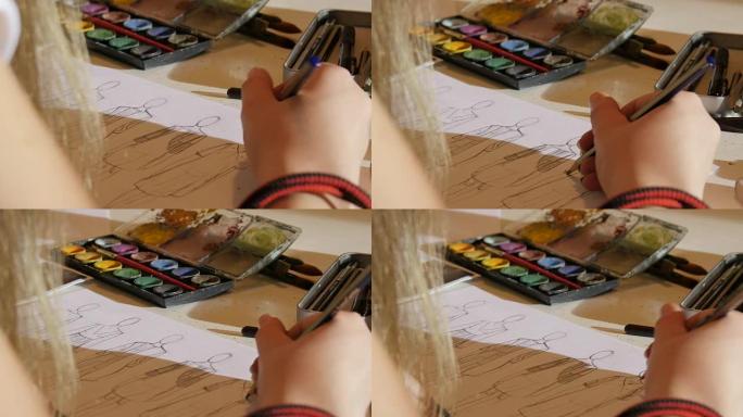 艺术课。时尚学生画女装