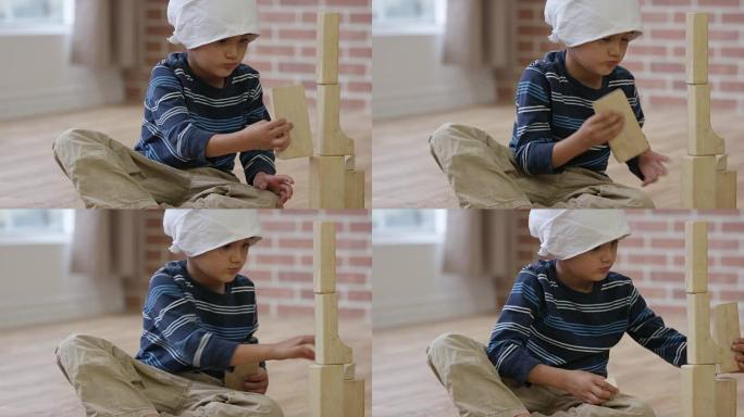患癌症的小男孩玩积木