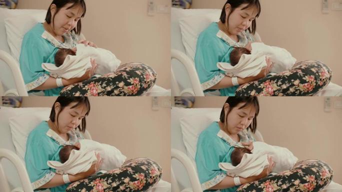 母亲在医院母乳喂养新生婴儿