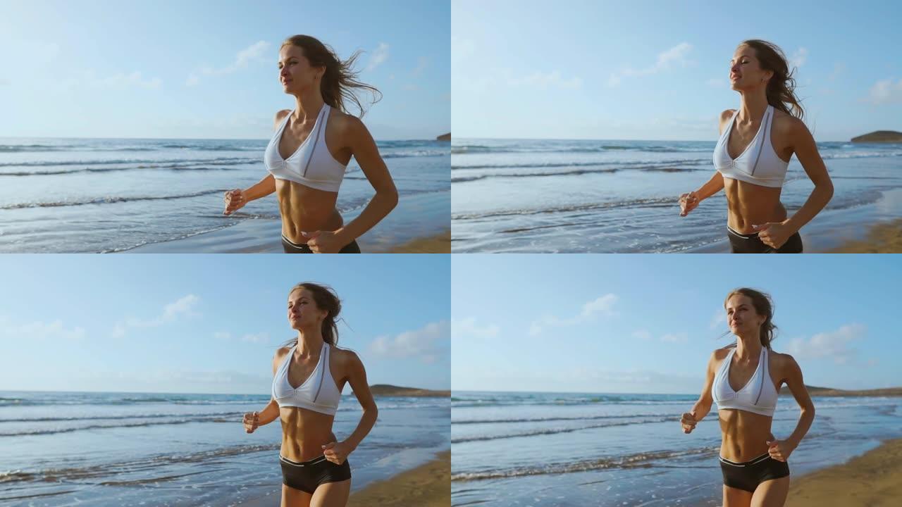 一位身材苗条的年轻女子在日出时在海上从事体操。她沿着海边奔跑。顺序摄像机稳定器拍摄。慢动作