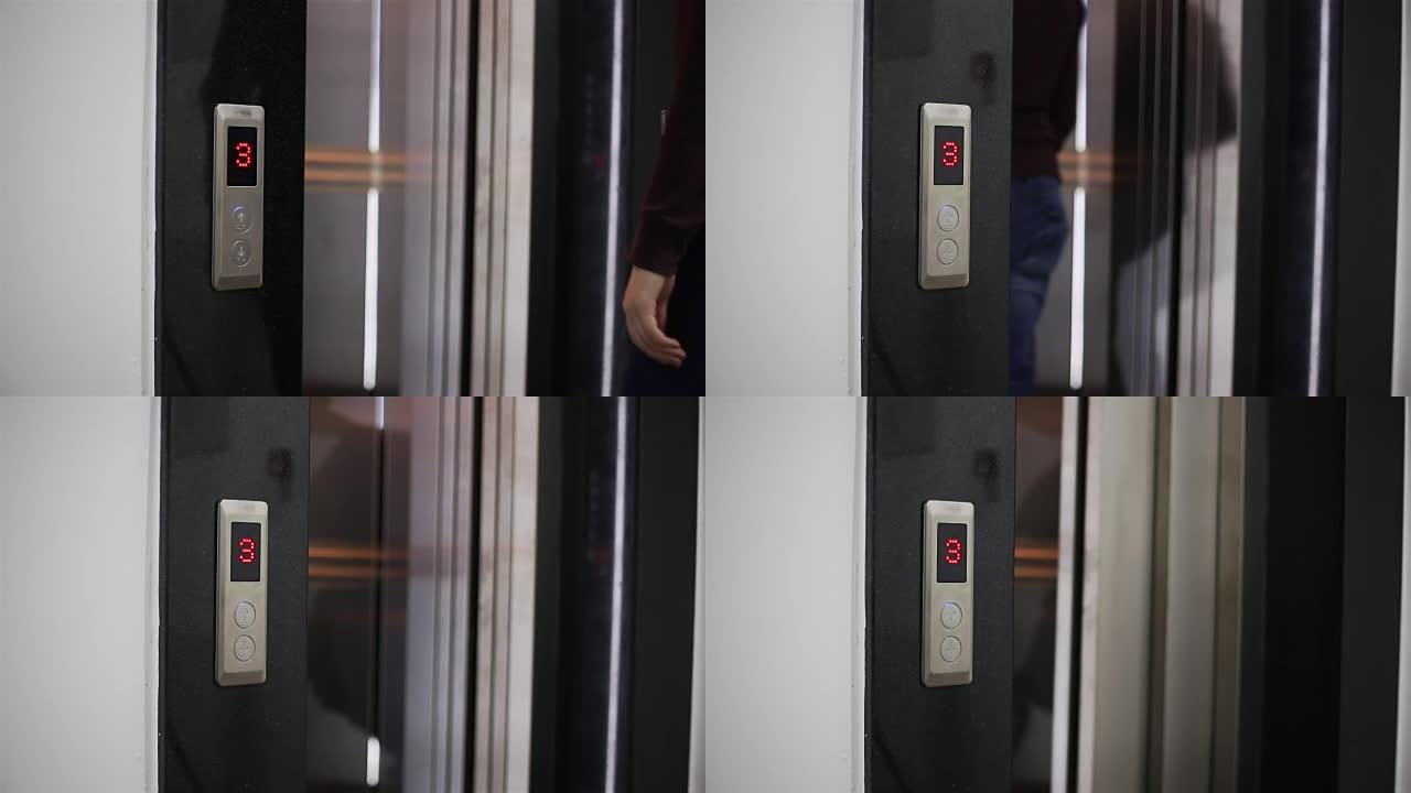 男性走进电梯上电梯乘坐电梯走进电梯