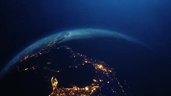 行星地球城市的夜晚照亮了空间站。