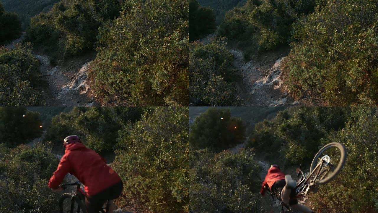 男性山地自行车手在岩石小径上有令人讨厌的擦伤