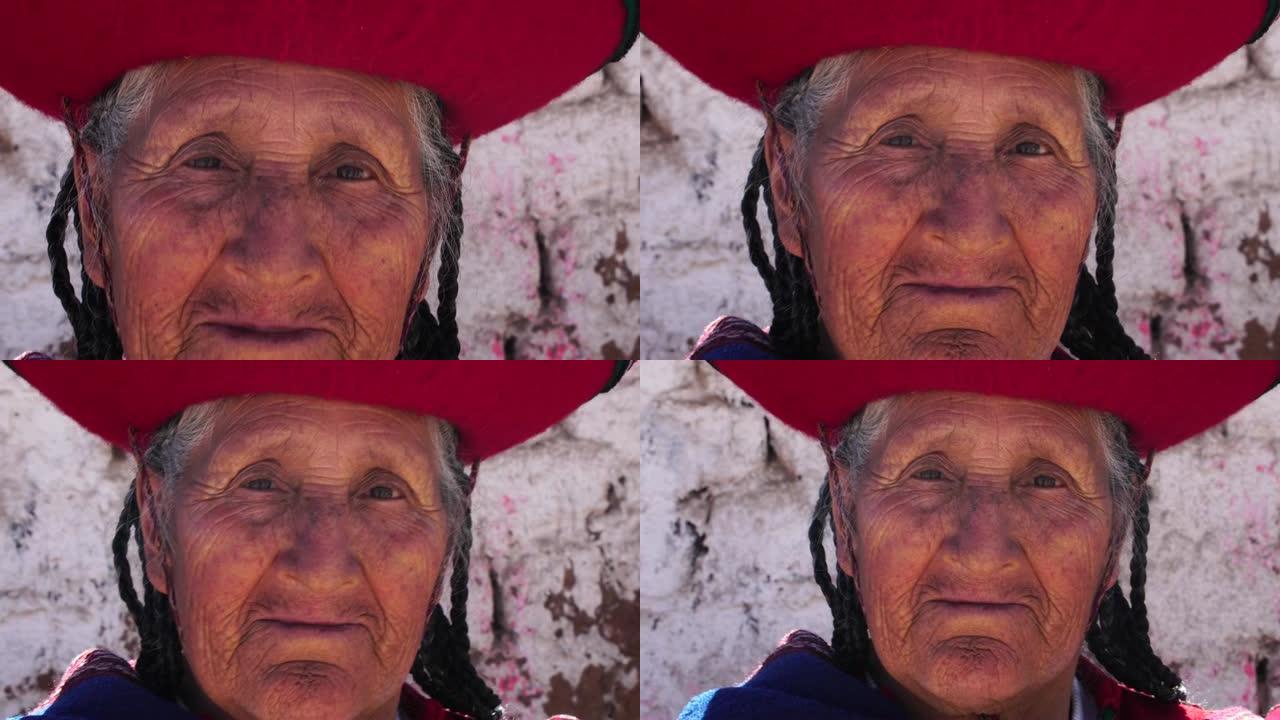 秘鲁Chinchero戴着传统帽子的老年妇女