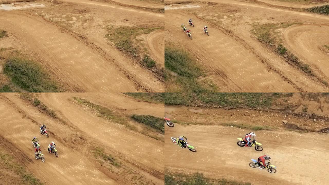 空中越野摩托车骑手在泥泞的小径上比赛