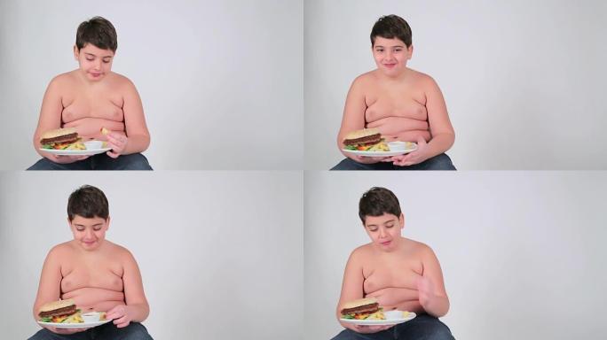 吃炸薯条的男孩肥胖均衡饮食习惯