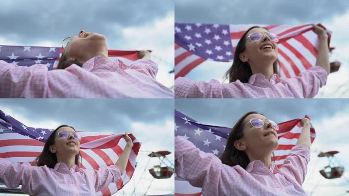 妇女挥舞着美国国旗，爱国者，为他们国家的年轻人确保未来