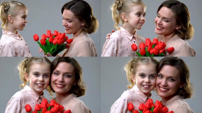可爱的女孩送花给心爱的母亲，生日或3月8日惊喜