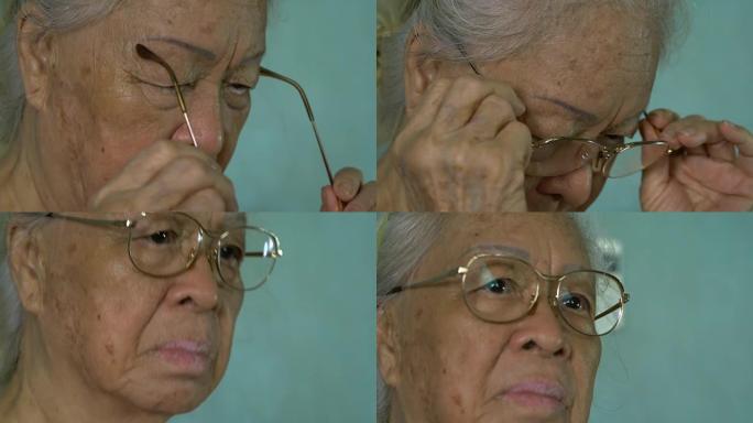 高级肖像，戴眼镜的快乐老妇人，亚洲模特。
