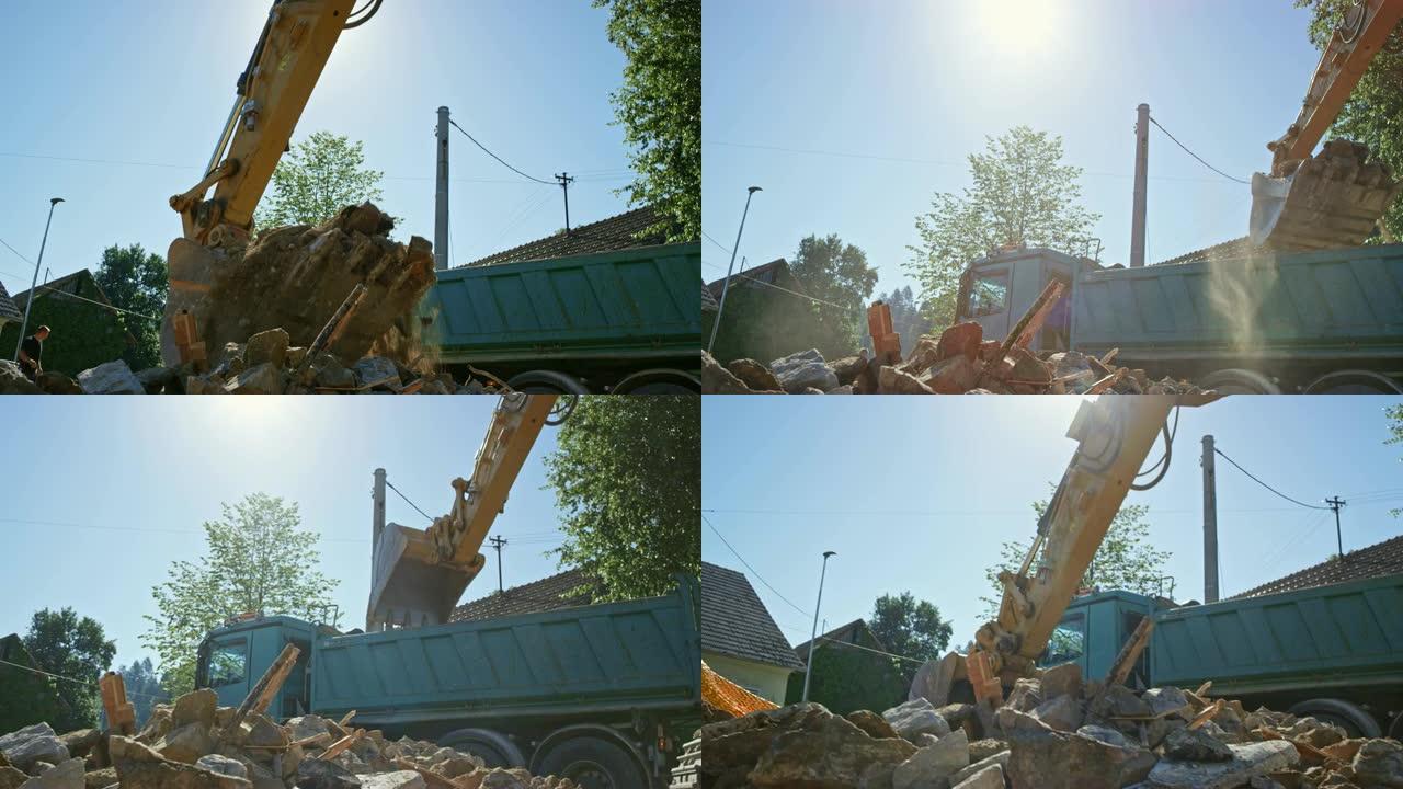 SLO MO挖掘机铲斗装满了建筑碎屑，在阳光下被装载到卡车上
