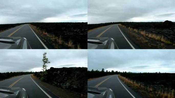 穿越火山景观的移动汽车的视点
