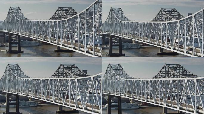 无人机在穿越新奥尔良新月城市连接桥的汽车旁飞行