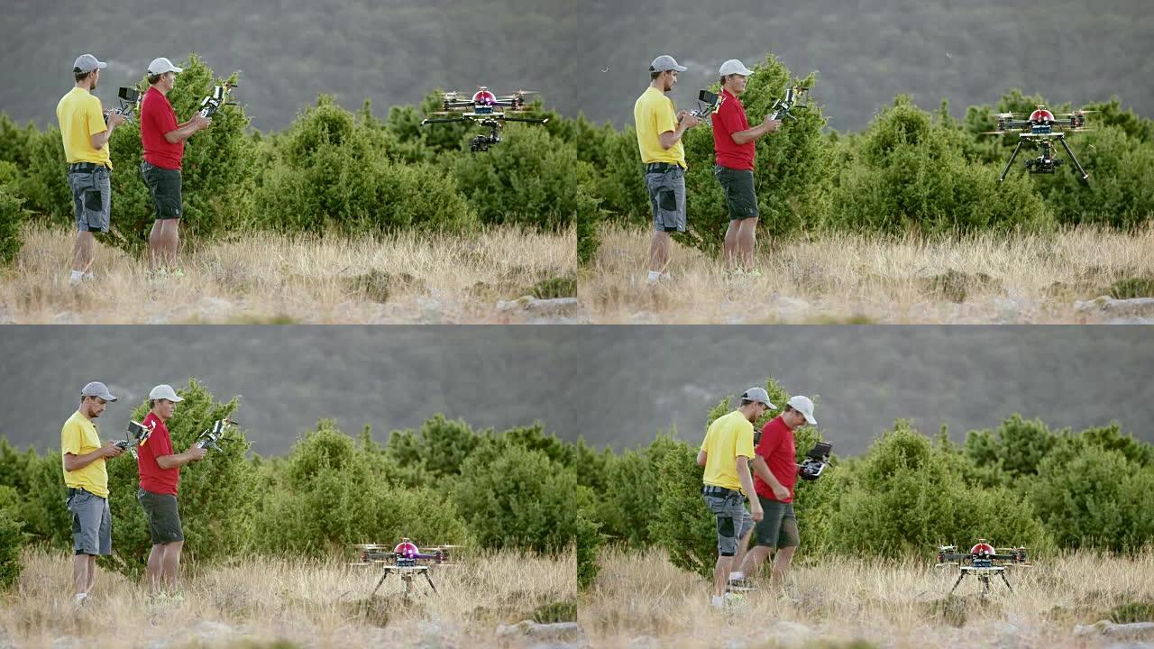 两名操作员成功将一架无人机降落在山顶