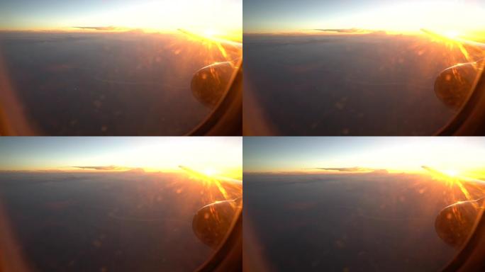 从飞机窗口日落观看