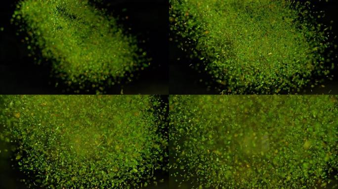 干燥的绿色草药向相机镜头移动的SLO MO LD爆炸