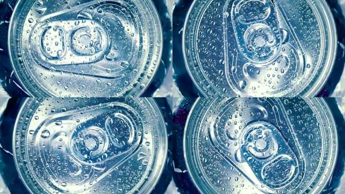 铝苏打锡罐盖软饮料在冰上绕一圈。