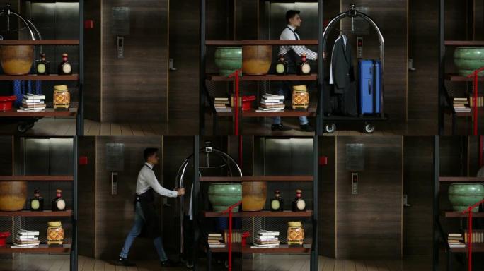拉丁美洲行李员推着行李车穿过酒店的走廊