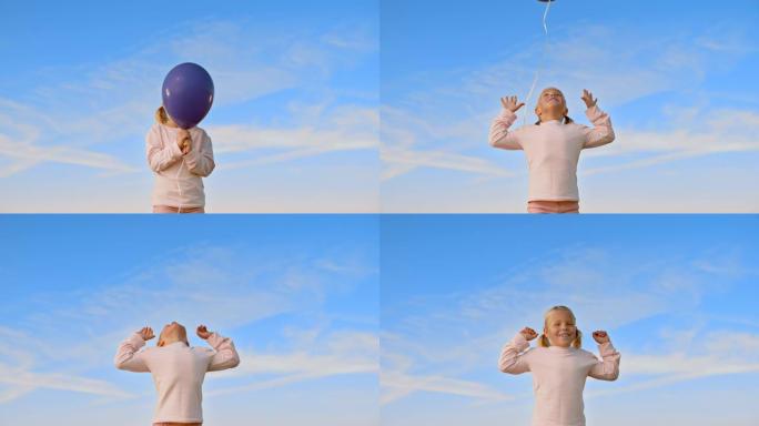 SLO MO小女孩放开紫罗兰色的气球，仰望天空，微笑着