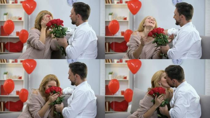 一个男人送了一束红玫瑰给一个非常惊讶的女人，庆祝情人节