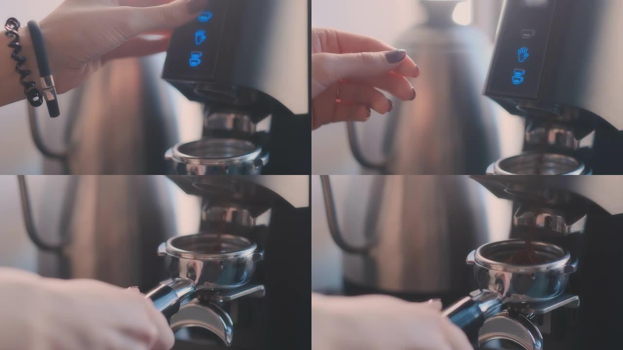 只需按下按钮。portafilter中的新鲜研磨咖啡。咖啡师用咖啡机研磨咖啡豆。咖啡研磨机将烤豆磨成