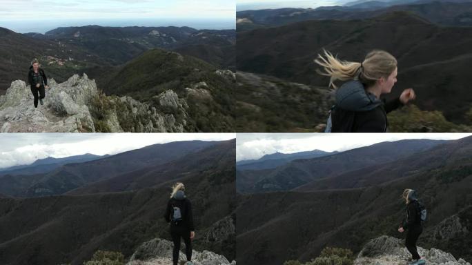 女越野跑运动员登上山脊