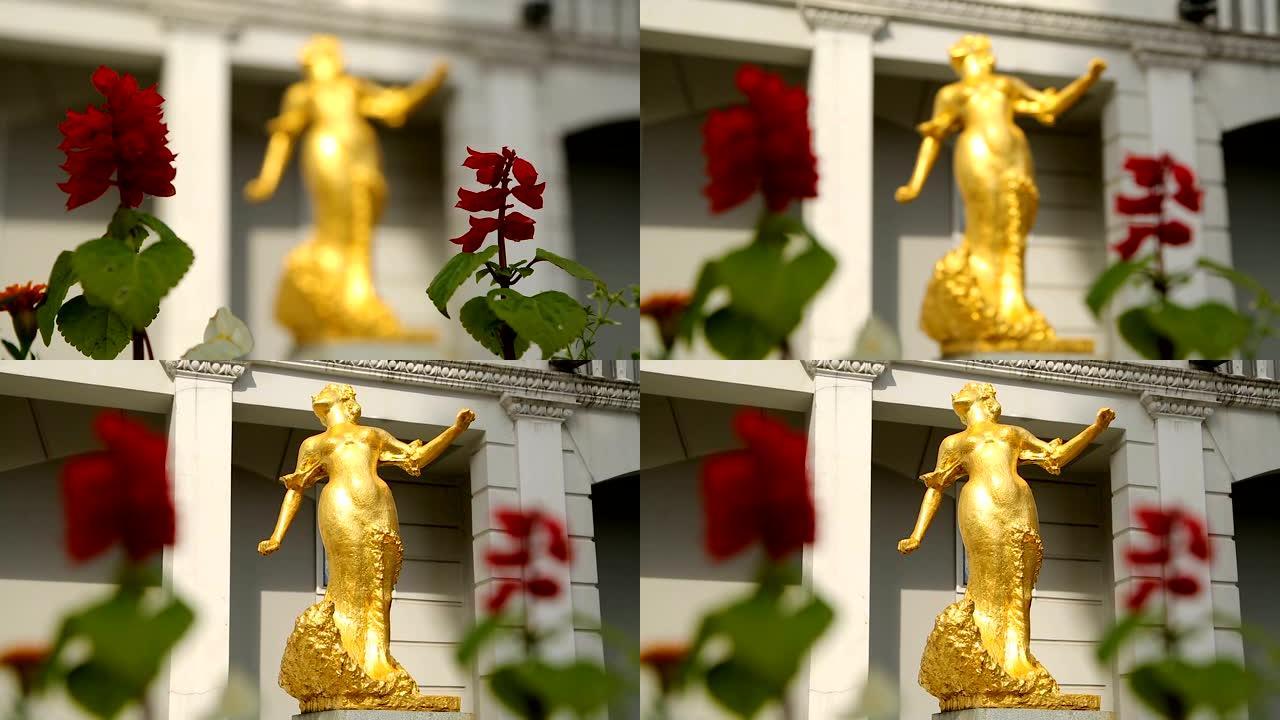 佐治亚州巴统中央广场上精致的金色女人雕像