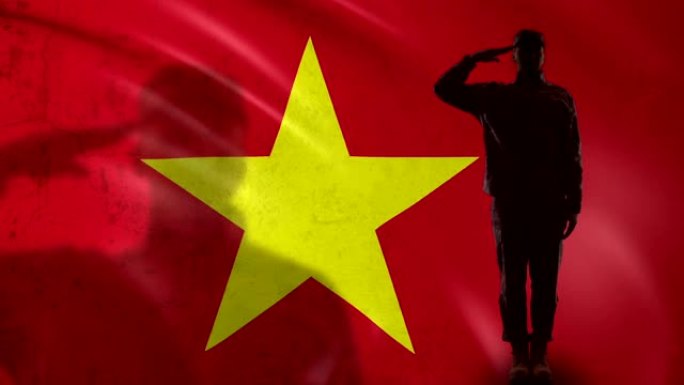 越南士兵对着国旗敬礼，责任